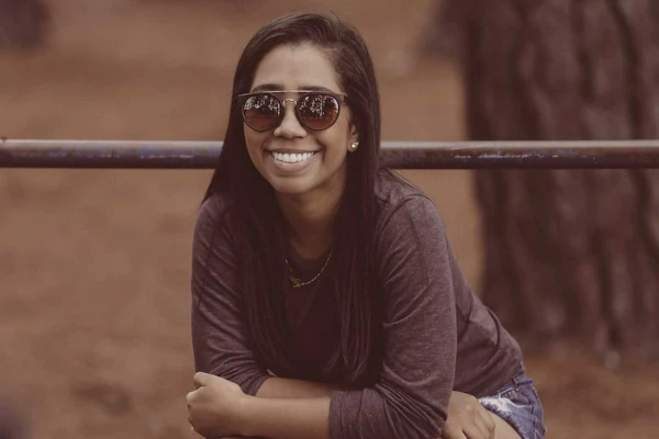 Teenager using Invisalign clear aligners